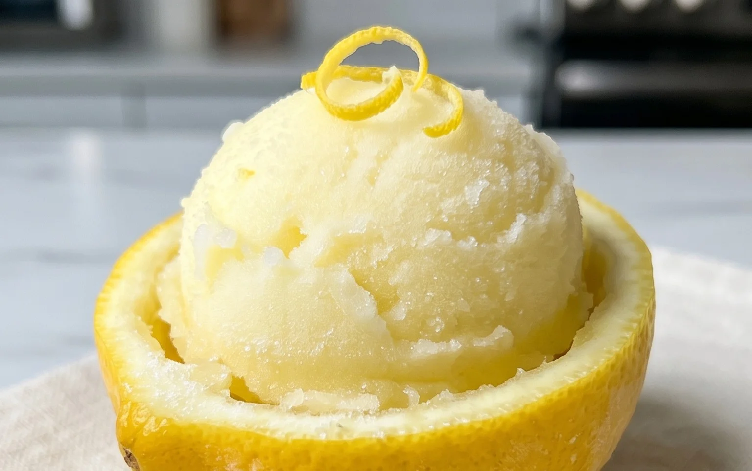 Sorbetto di Limone Dressed Up in a Frozen Lemon Shell
